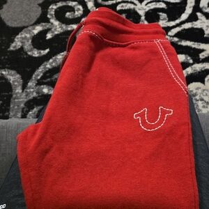 True Religion Red Joggers with white Details.